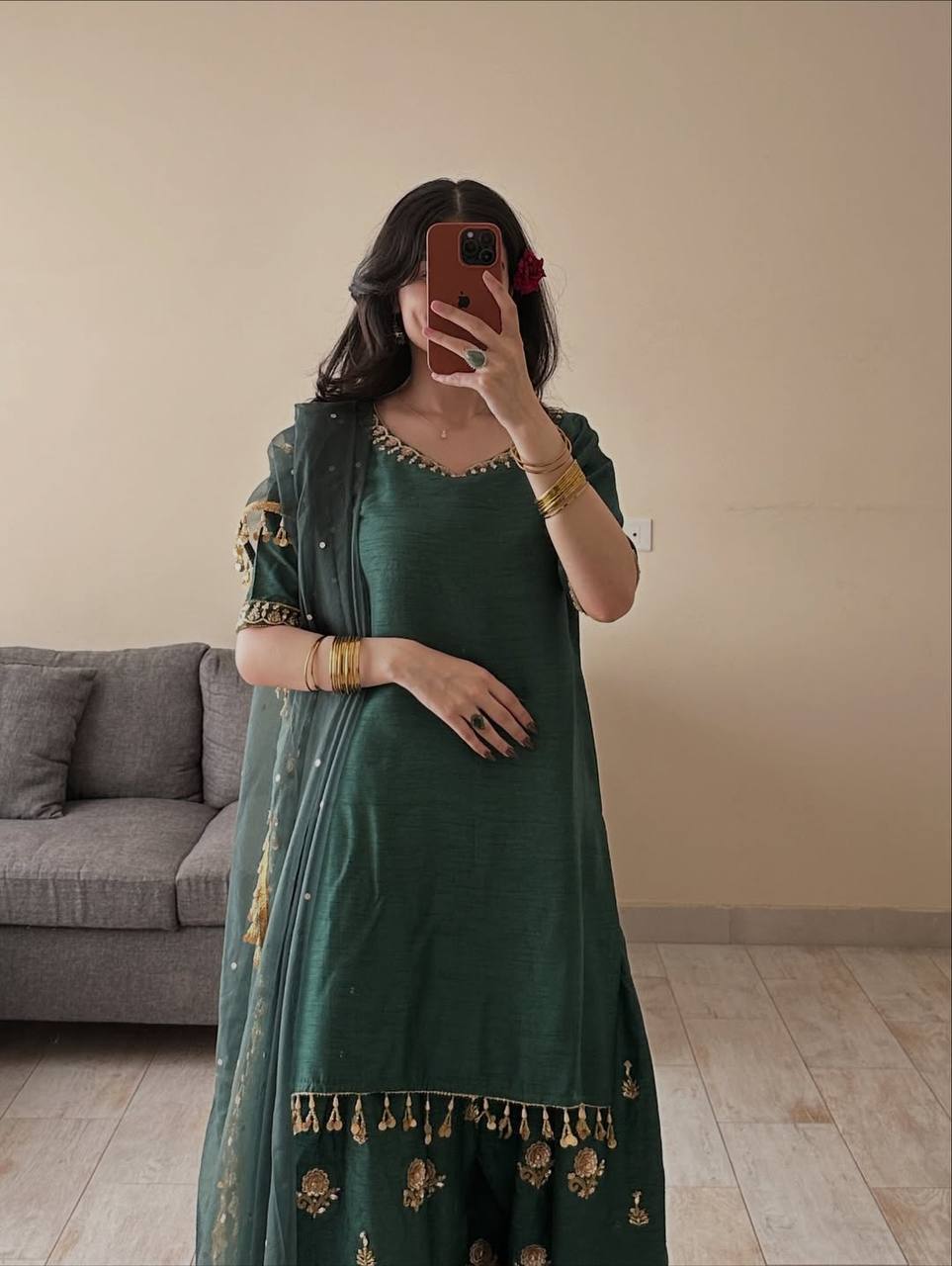 Majestic Emerald Green Kurta and Salwar Suit Set Featuring Intricate Gold Embroidery, Floral Motifs, and Ornate Coin Tassel Embellishments